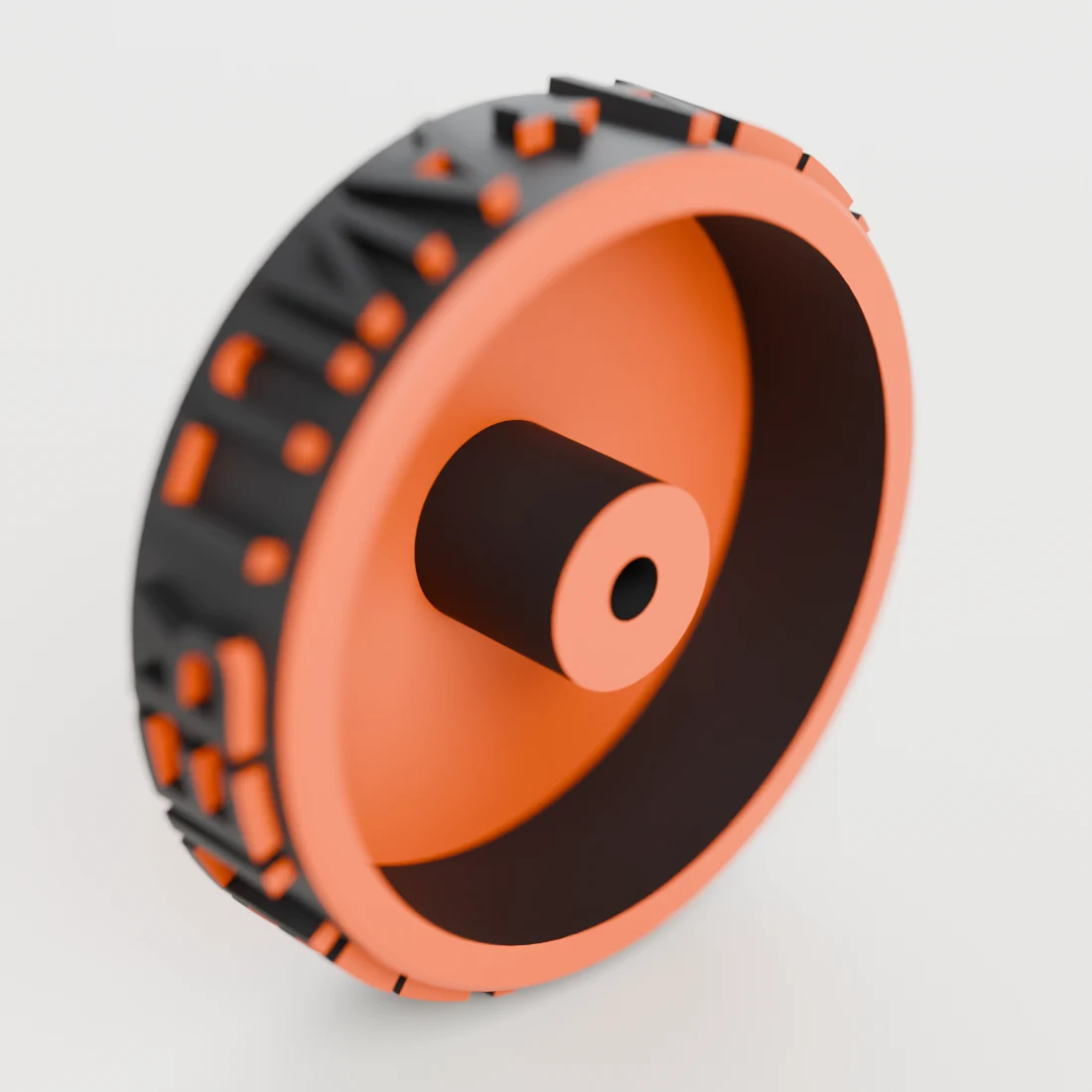 Gros plan sur une roue orange gravée en relief